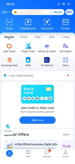 Alipay international home screen showing travel services and Add Credit or Debit Card banner