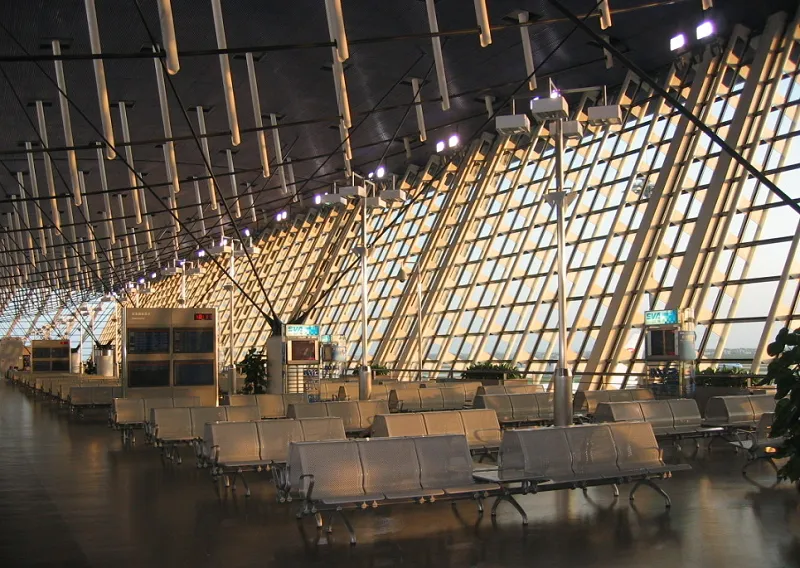 An empty terminal seating area at Shanghai Pudong International Airport