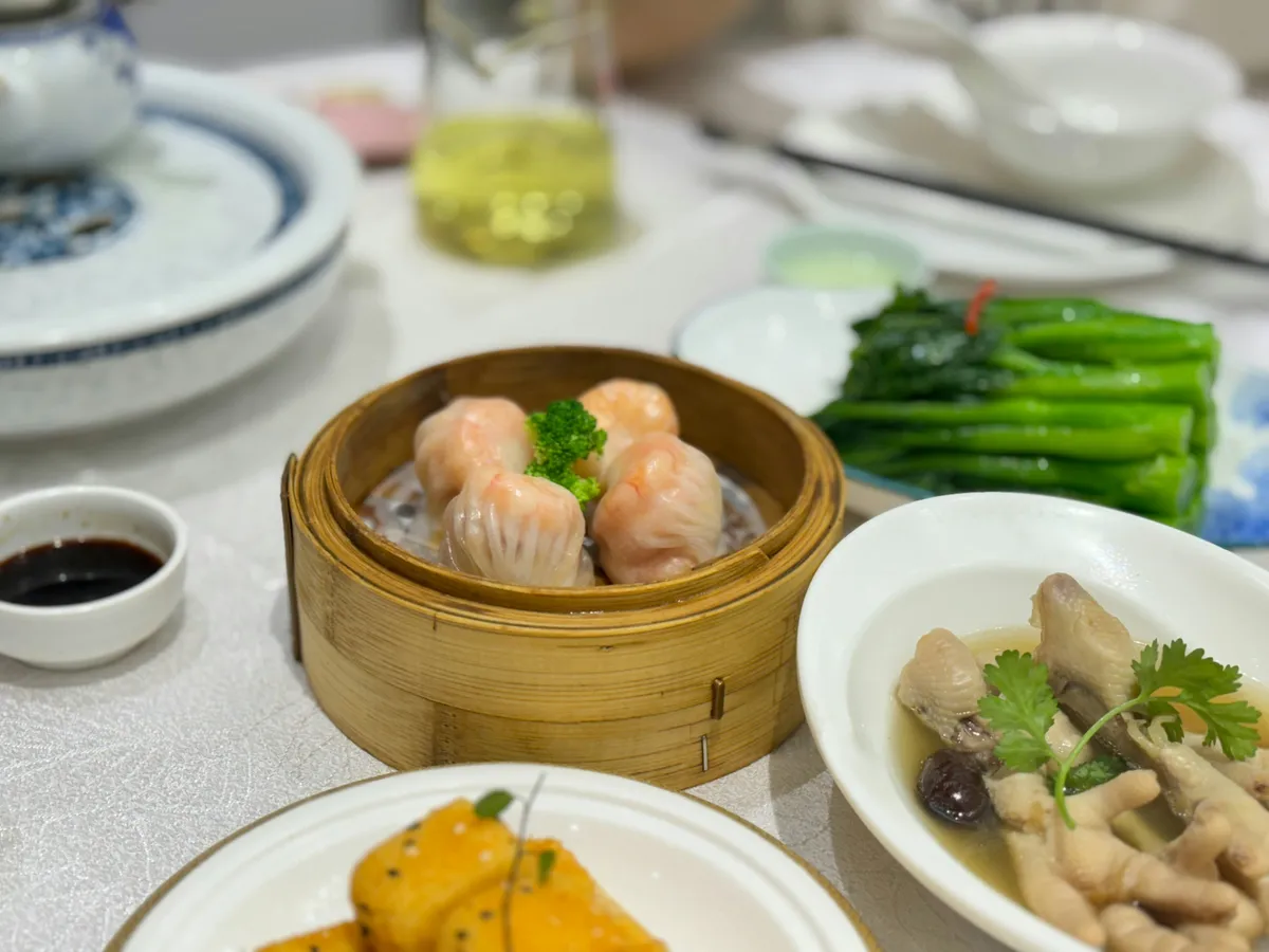 Bamboo steamers of dim sum on a restaurant table