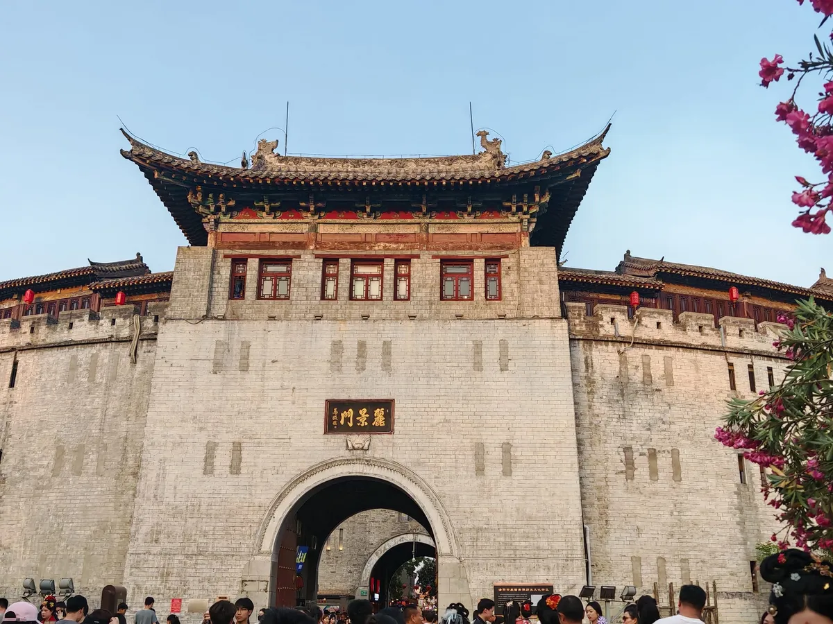 The white stone Lijing Gate archway marking the entrance to Luoyang's old town