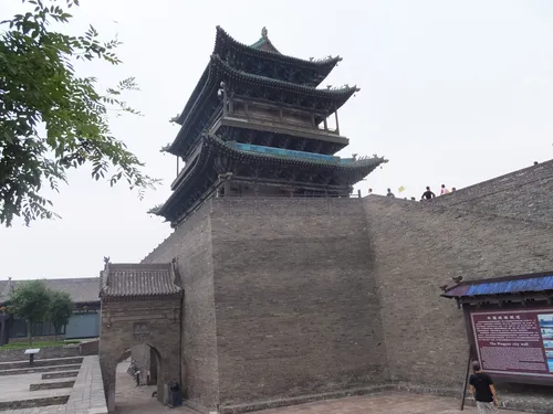 The gate tower and brick walls of Pingyao's ancient city, where the Meet Pingyao show is staged