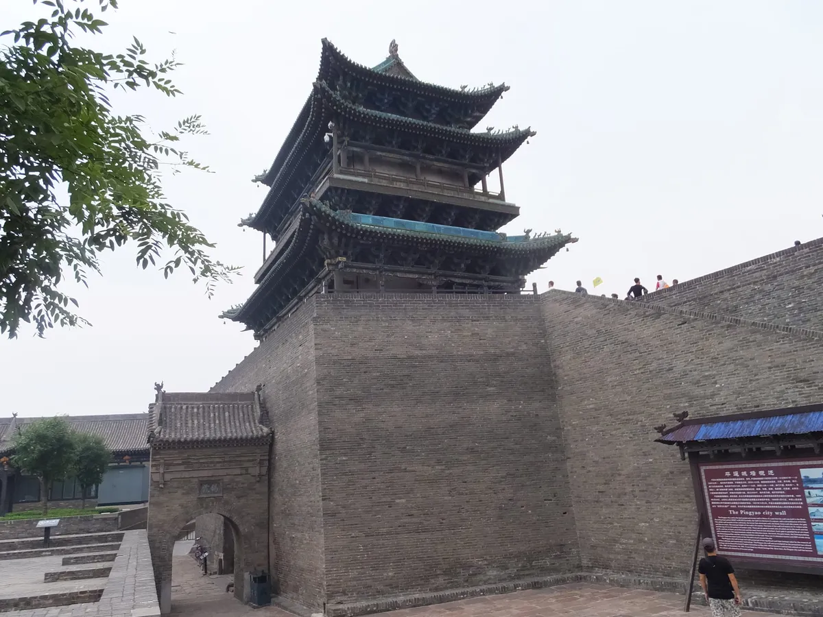 The gate tower and brick walls of Pingyao's ancient city, where the Meet Pingyao show is staged