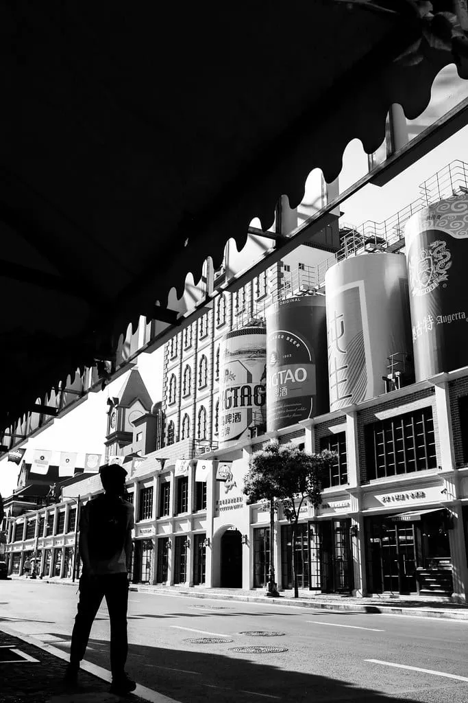 The Tsingtao Beer Museum's German-colonial-era brick facade with giant beer-can-shaped rooftop tanks